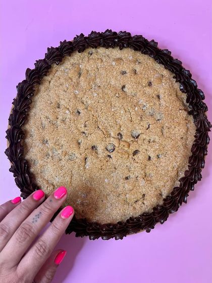 Apparently, giant cookies are a thing now, so I made one. This is my classic chocolate chip cookie, supersized and finished with a chocolate buttercream border.