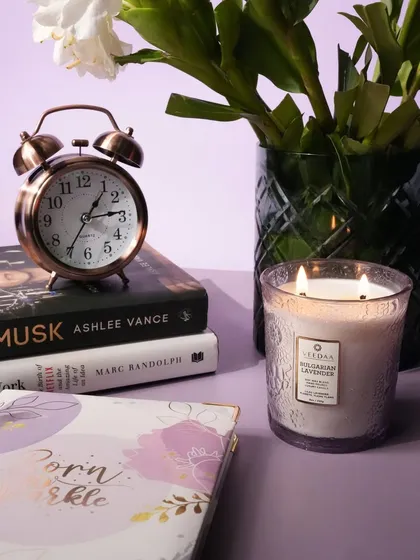 Relax and unwind with our Bulgarian Lavender two-wick candle. Poured into an engraved, hand-cut glass vessel, this candle is perfect for creating a calming ambiance for your evening wind-down routine.