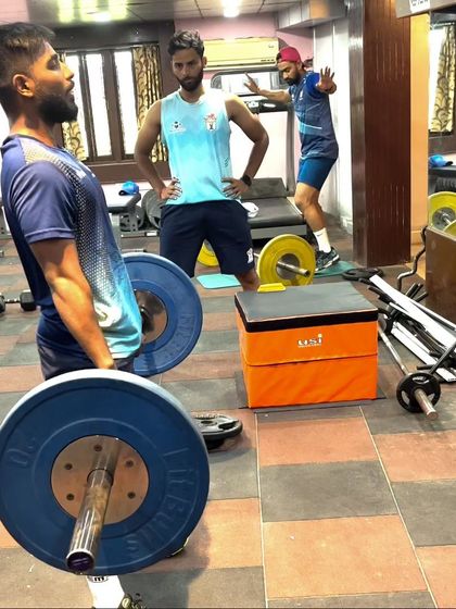 The same athlete at the top of the clean, demonstrating powerful hip extension. My coaching ensures athletes master these technical lifts safely and effectively.