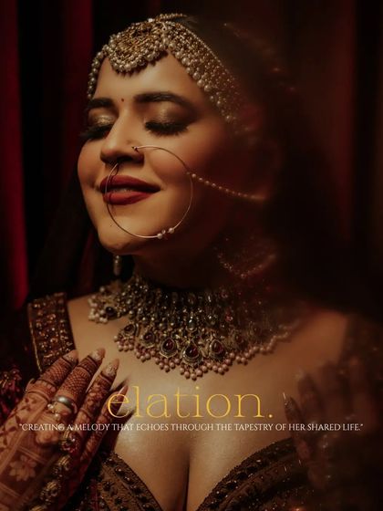 A joyful, eyes-closed portrait of Vanshita, her hands gently on her chest, her expression one of pure elation and contentment.