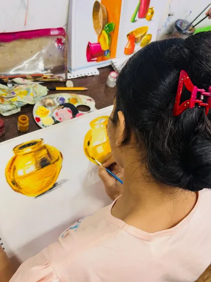 Focus and dedication in our Vashi studio. A student from our elementary exam batch is practicing metal painting techniques, learning how to render light and reflection on a curved surface to make the object look three dimensional.