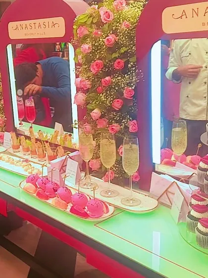 A vibrant and stylish dessert and beverage bar we designed for a corporate event with Anastasia Beverly Hills. We create themed setups that integrate seamlessly with your brand's aesthetic, featuring custom treats like lip-themed cupcakes and colorful mocktails.