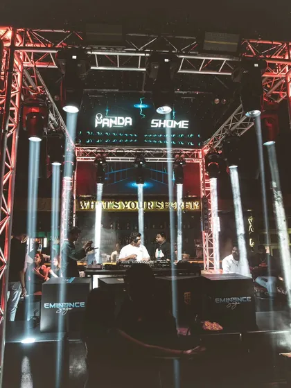 The stage is set for a massive night with my name in lights. This shot shows the impressive lighting rig and stage setup at 'What's Your Secret', promising a high-production club experience.