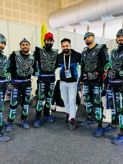 Posing with an event organizer after our performance for the Para Games 2023. We are always thrilled to be a part of inspiring events.