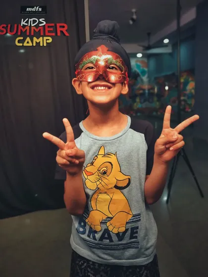 Getting creative with masks and poses. Besides dance and fitness, we include fun activities that spark imagination and playfulness.