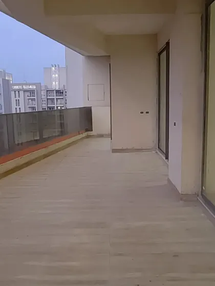 The exterior balcony of the apartment project during construction. Even outdoor spaces are considered part of the overall design, planned to connect seamlessly with the interiors.