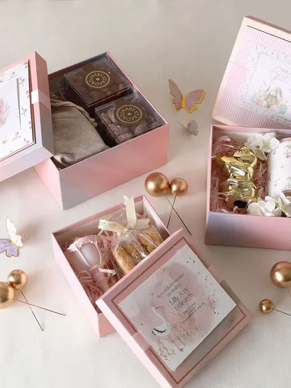 The same return favor concept, but in a lovely pink theme for a baby girl's arrival. Each box is thoughtfully curated with different treats.