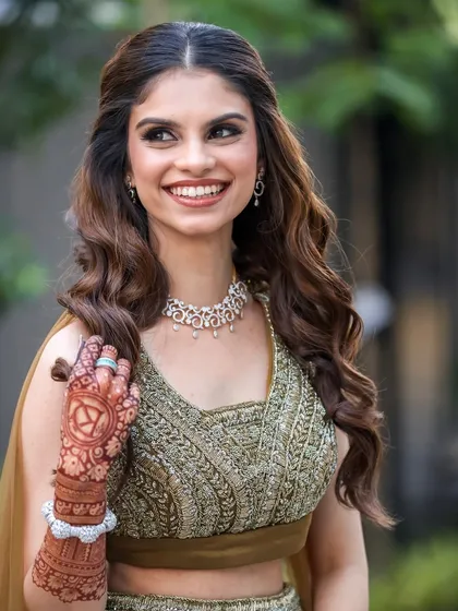 A close-up on this stunning engagement bride. You can see the detail in her henna and the way the soft, glamorous makeup enhances her natural beauty.