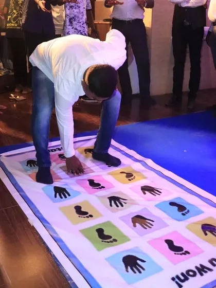 Another player takes on the challenge of the mat game. This activity is a staple at many of my events because it's always a crowd-pleaser.
