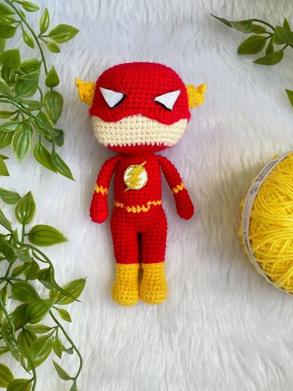 The Flash! This superhero doll was made with a special head shape as requested by the customer. I love getting the details right, like the lightning bolt emblem on his chest.