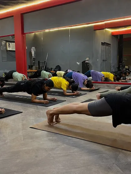 Another angle of the group plank hold, showing the determination and strength of my students.