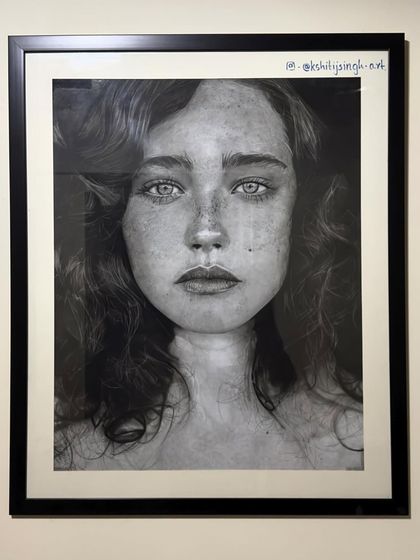 Another shot of the framed portrait, showing how it looks in a home setting. It’s a large piece, measuring 72x56 cm, designed to be a centerpiece.