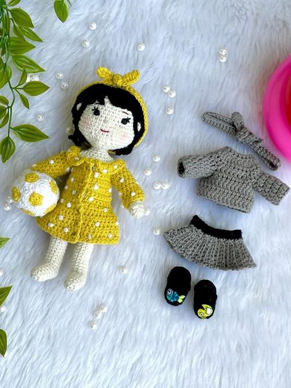 This special project was to recreate a little girl's first birthday outfits on her own mini replica doll. The doll comes with two removable dresses and accessories, making it a beautiful toy and a cherished memory keeper.