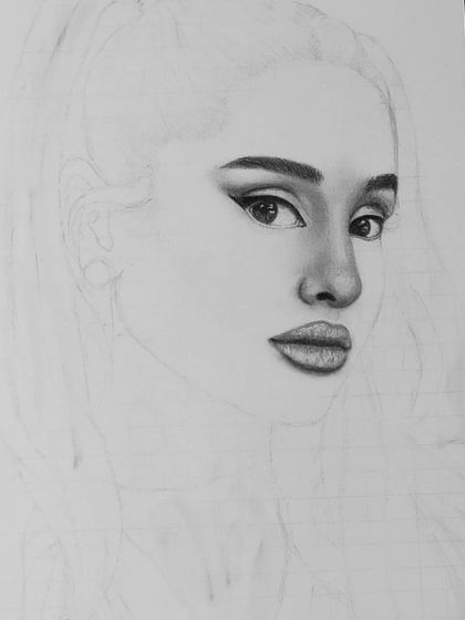The very beginning of the second Ariana Grande portrait, with only the eyes, nose, and mouth shaded.