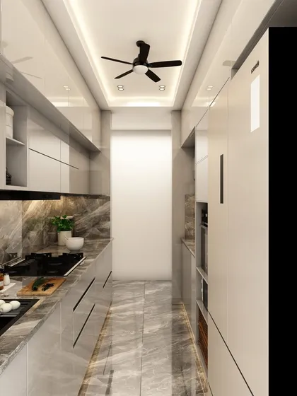 This view of the galley kitchen highlights the efficient layout, with ample storage and countertop space on both sides, perfect for compact homes.