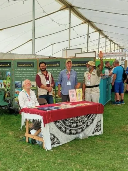 A cheerful moment at our stall, showcasing the friendly and welcoming spirit of our team. We believe that a great adventure starts with great people.