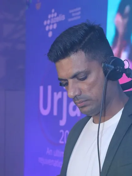 A focused moment during the 'Urja 2024' corporate event. Every track is carefully selected to maintain the event's energy.