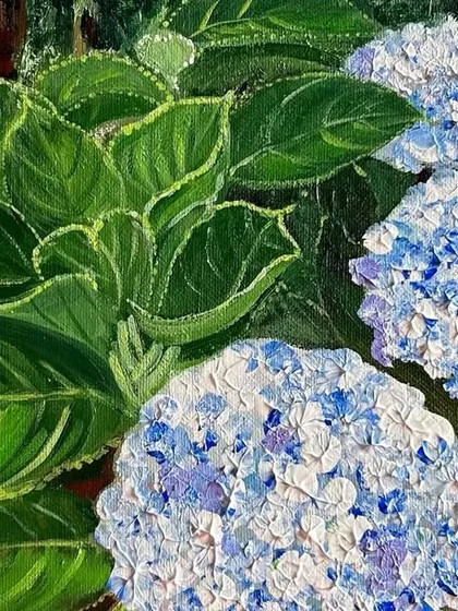 A close-up of the finished hydrangea painting. The textured brushstrokes give the flowers a three-dimensional feel, making them seem to pop off the canvas.