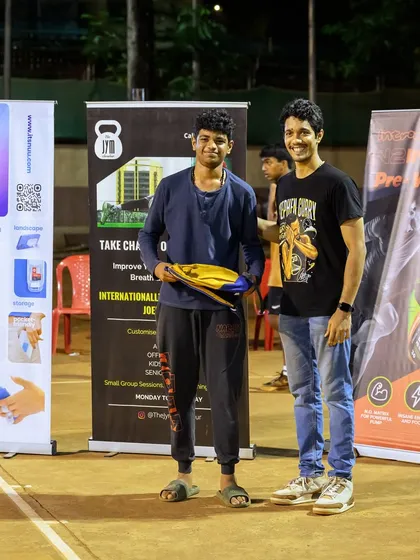 The Rebounding Champ of the U-18 category at Hooplah '24, Yohan, receiving his award.