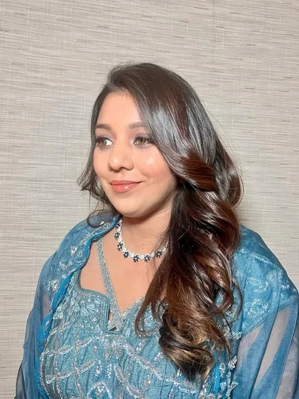 This look is all about achieving that coveted glass skin effect. I paired the ultra-dewy skin with soft curls for a radiant and captivating appearance.