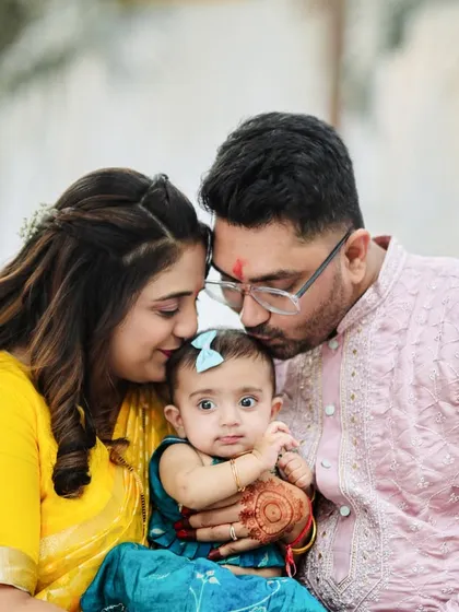 A quiet moment of love between new parents and their baby. We focus on capturing these gentle, unscripted family bonds during our naming ceremony and family photoshoots in Mumbai.