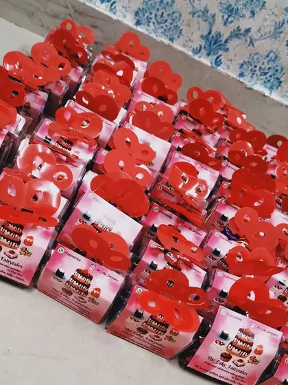 Preparing a large order of dry fruit chocolate boxes for gifting. If you need return gifts for a wedding or party favors for an event, I can prepare these small, personal boxes for all your guests.