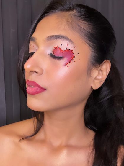 The "dripping in diamonds" look with eyes closed, showing the precision of the gem application. This level of detail is a key part of our advanced training.