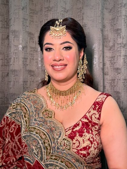 Samiksha, looking beautiful for her brother’s wedding. The makeup is classic and elegant, with a focus on her eyes.