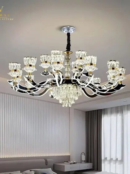 This is our Manila Smart LED Chandelier, a beautiful mix of classic crystal and modern design. It's not just about looks; you can control it with your phone or voice, and it has three color modes to match your mood.