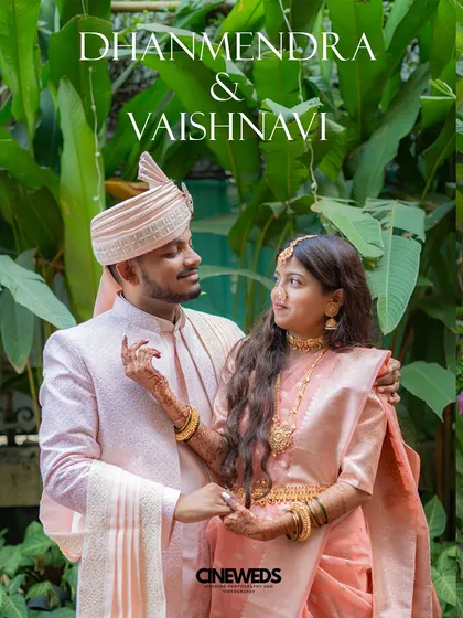 An elegant portrait of the couple, Dhanmendra and Vaishnavi, on their Haldi day, dressed in beautiful coordinated pastel pink outfits.