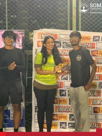 Nirmayee Chiplonkar receives the Best Striker award, recognizing her goal-scoring prowess for the victorious K. J. Somaiya Medical College team.