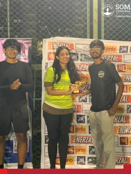 Nirmayee Chiplonkar receives the Best Striker award, recognizing her goal-scoring prowess for the victorious K. J. Somaiya Medical College team.