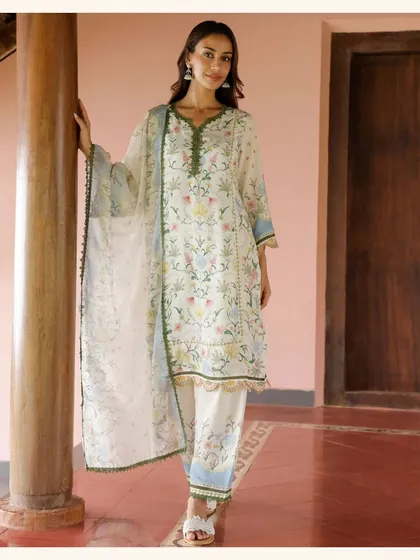 This floral printed kurta set is one of my classic designs. The soft colors and delicate green border make it a beautiful and versatile piece.
