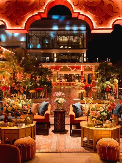 A view through the Moroccan-inspired arches at our 'Midnight Marrakesh' event. The space was designed to feel like a cozy courtyard where colors dance in harmony and patterns tell stories.