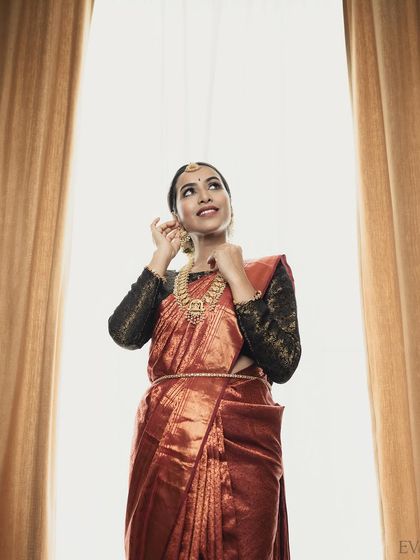 A creative shot from a professional photoshoot, where the makeup remains a key part of the elegant and classic story.