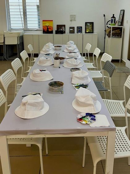 The calm before the creative storm! Our studio set up and ready for a bucket hat painting birthday party.