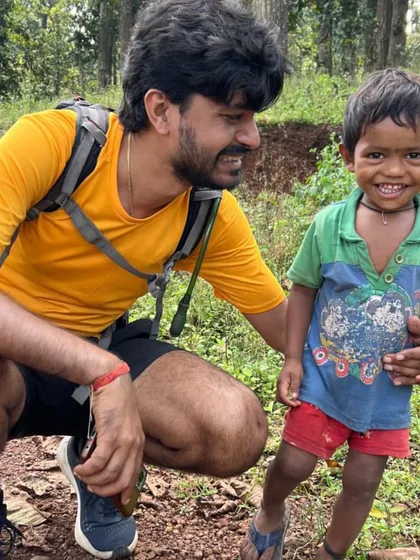 A heartwarming moment between our tour leader and a child from a local village in Kanha. The smiles we share along the way are the most precious souvenirs.