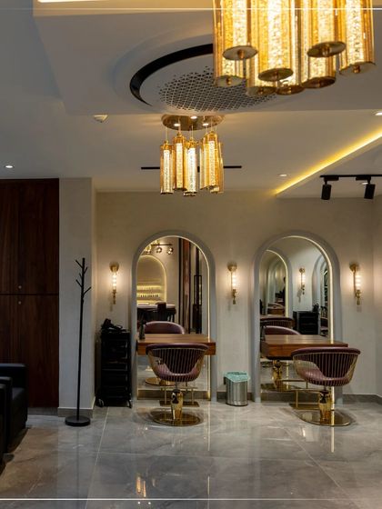 A look inside my Srinagar salon. The interior features elegant styling stations with plush chairs and perfect lighting, creating a sophisticated and comfortable atmosphere for your transformation.