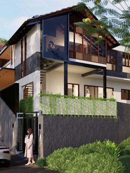 Nestled in the Western Ghats, the Gurukrupa Residence embodies a harmonious blend of contemporary style and traditional Kodava aesthetics. Multiple access points at various levels ensure effortless navigation through this thoughtfully crafted home.