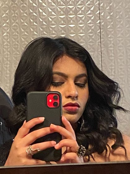 A close-up selfie from the behind-the-scenes of a music video shoot. It was a great experience collaborating with such a talented team.