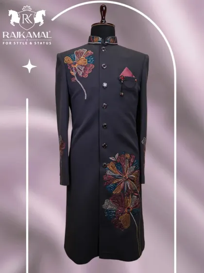 Another view of the dark grey Indo-Western sherwani with vibrant floral embroidery, a timeless fit for any celebration.
