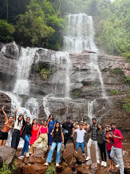 Pure excitement from our Chikmagalur group as they pose and celebrate in front of a gorgeous waterfall.