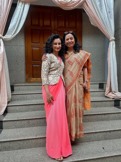 A precious moment with one of my beloved professors at Mount Carmel College. Their guidance and support have been invaluable throughout my career.