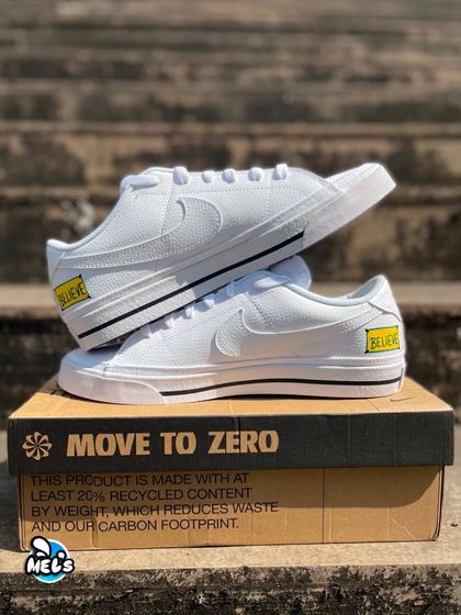 A product shot of the AFC Richmond custom Nikes, showing the "BELIEVE" design on the heels.