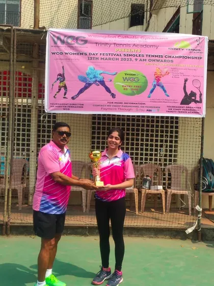 The runner-up of the Women's Singles event is awarded her trophy. Every participant's effort is acknowledged in our professionally managed tournaments.