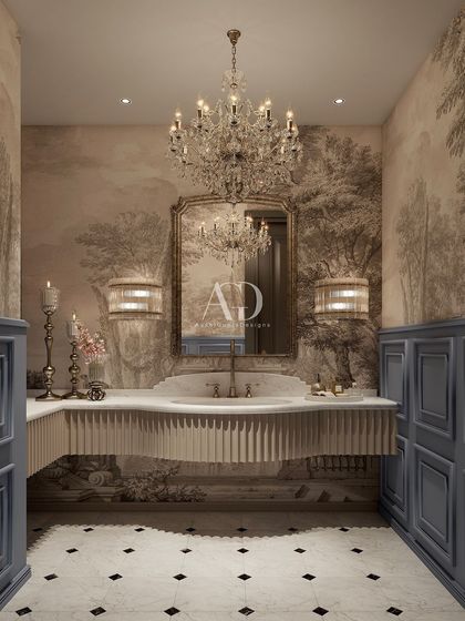 This powder room makes a bold statement with its dramatic wallpaper and contrasting blue wainscoting. The fluted vanity and ornate mirror add layers of texture and sophistication, turning a small space into a jewel box.