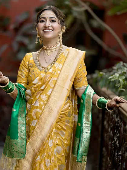 The bride's joyful laugh is infectious. A perfect candid moment showing the makeup in action.