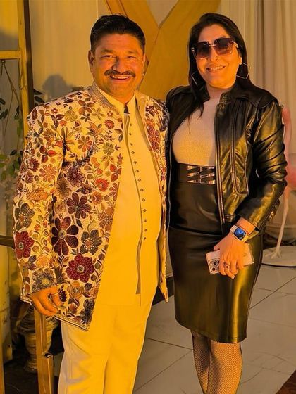 This photo shows the client enjoying his event in my floral jacket. Renting an outfit like this allows you to wear something bold and memorable for a special occasion without committing to a purchase.