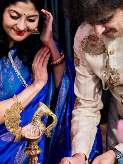 A closer look at the lamp lighting ceremony, a significant ritual that symbolizes the dispelling of darkness and the pursuit of knowledge.