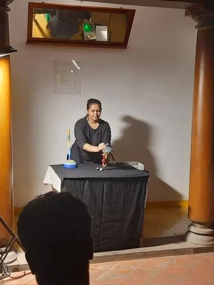 Our puppeteer captivating the audience during a solo show. Even a simple setup can create a powerful storytelling moment.